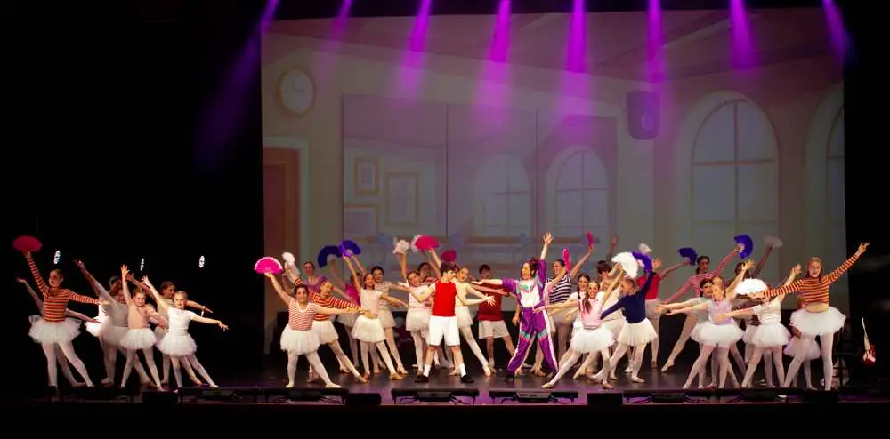 A ballet class number with feather fans